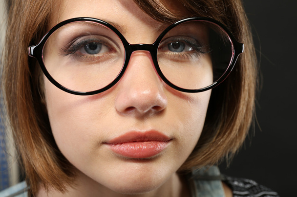 Attractive young woman with glasses  - Foto, imagen