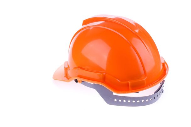 Chapéu de segurança laranja capacete duro, ferramenta proteger o trabalhador do perigo
 - Foto, Imagem
