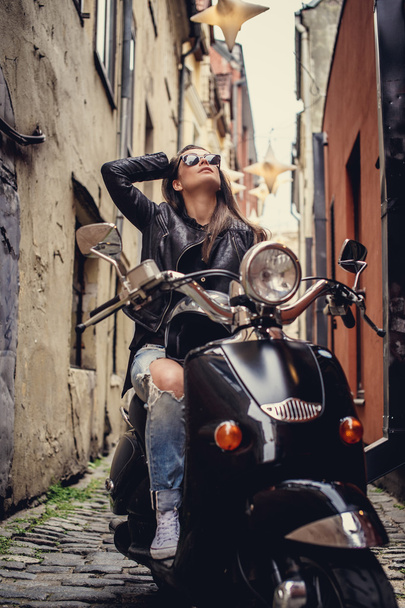 Happy young woman in black leather jacket  - Foto, imagen
