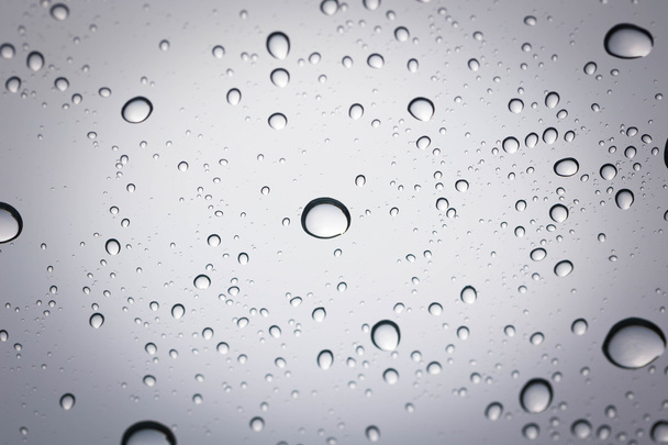 Water drop on glass mirror background. - Foto, Imagem