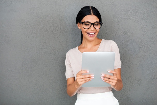 Joyful businesswoman holding digital tablet - Fotografie, Obrázek
