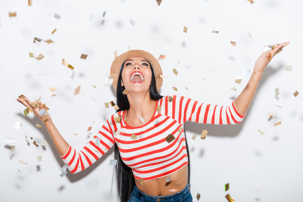 woman and confetti falling on her - Foto, imagen