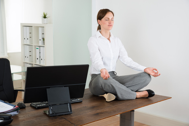 Businesswoman Doing Yoga - Фото, изображение