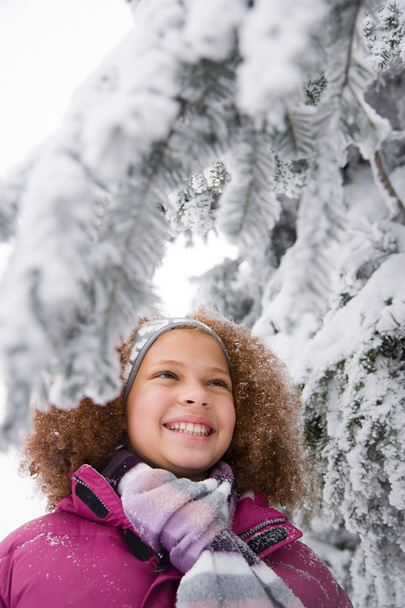 Girl and snowy branches - Photo, Image