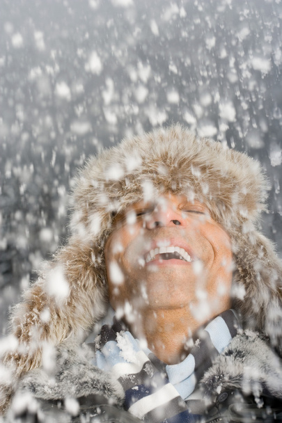 Portrait of the man in the snow - Photo, Image