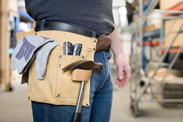 Workman with toolbelt - Foto, Bild