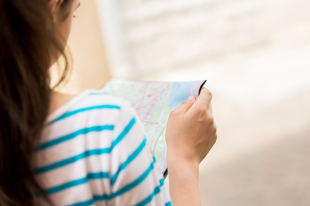 close up of woman reading map - 写真・画像