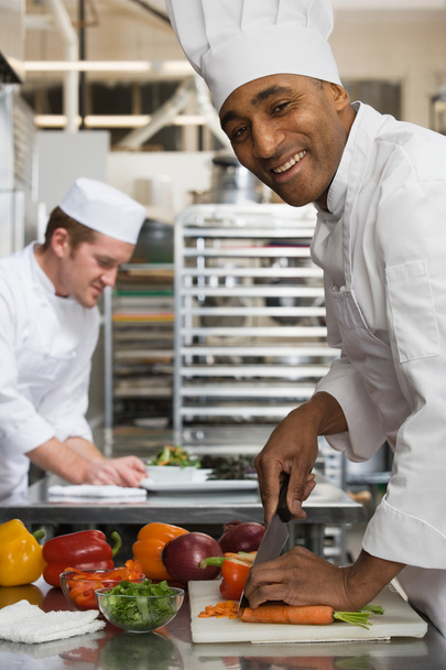 Dos chefs en la cocina
 - Foto, imagen