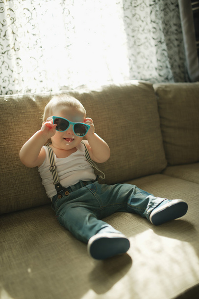 cute little boy in sunglasses - Fotó, kép