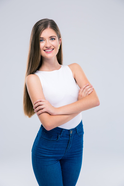 Female teenager standing with arms folded  - Foto, Imagem