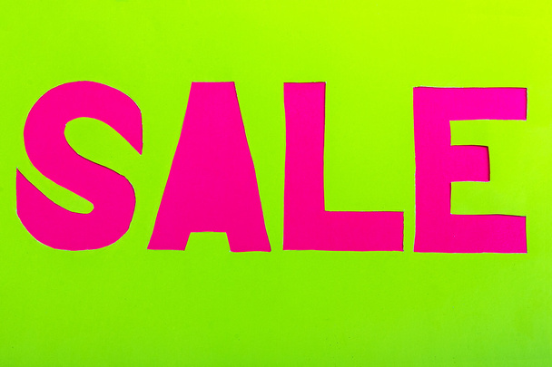 Sale paper sign in pink - Photo, Image