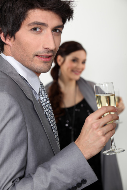 Elegant man drinking champagne - Foto, Bild