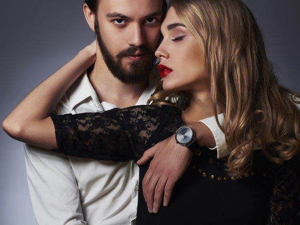 fashionable couple in tender passion. Beautiful woman near handsome man - Photo, Image