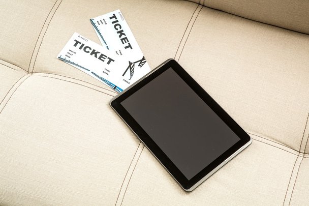 Acheter des billets de cinéma en ligne avec une tablette PC
 - Photo, image