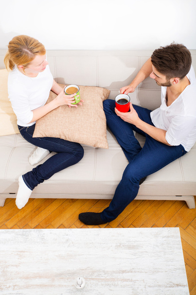 Young couple talking on the Sofa  - Photo, Image