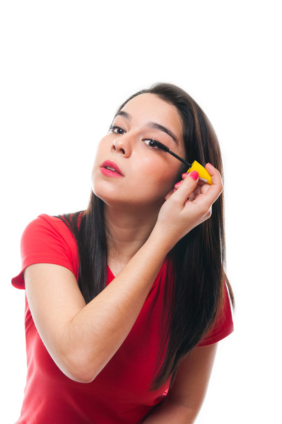 Bella giovane femmina applicando il suo make up
 - Foto, immagini