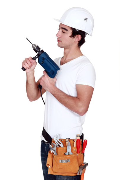 Young man with drill - Foto, Bild