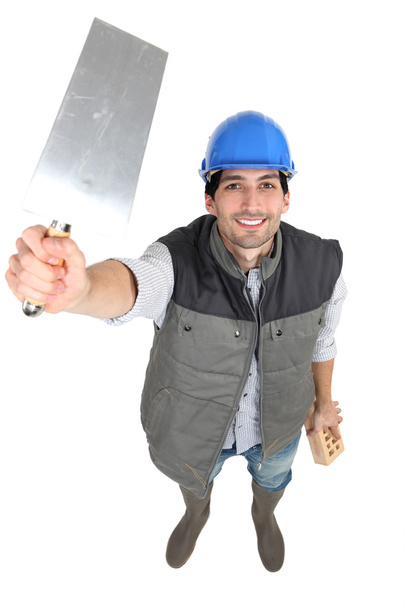 Builder with a trowel - Foto, immagini