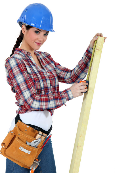 Female carpenter on white background - Photo, image