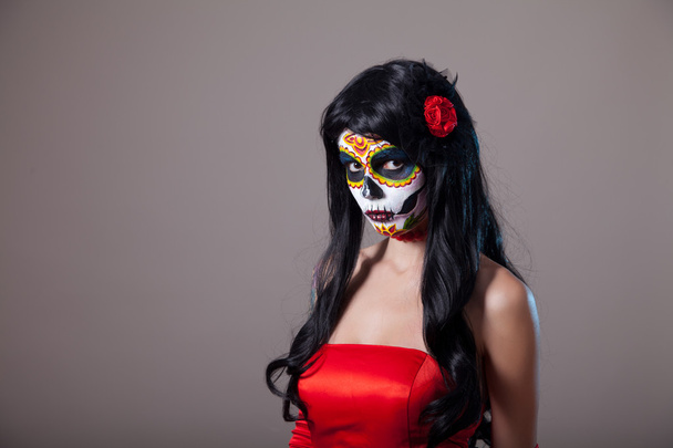 Sugar skull girl in red dress - Фото, изображение