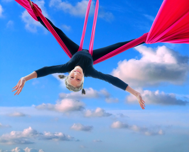 child hanging in beautiful summer sky - Valokuva, kuva