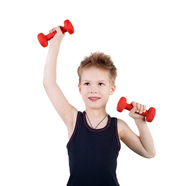 little boy training with dumbbells - Foto, immagini