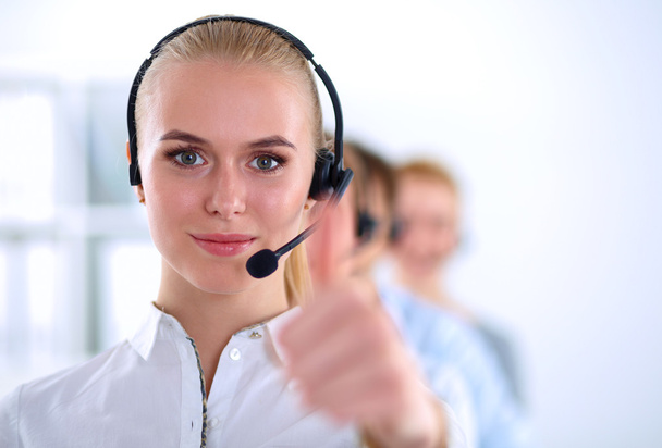 Smiling customer service girl showing ok, isolated on white background. - Zdjęcie, obraz