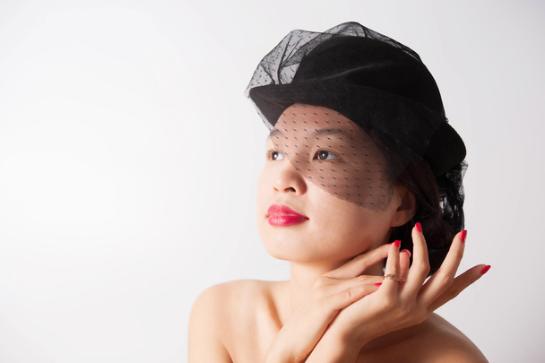 krásná žena s černým kloboukem - Fotografie, Obrázek
