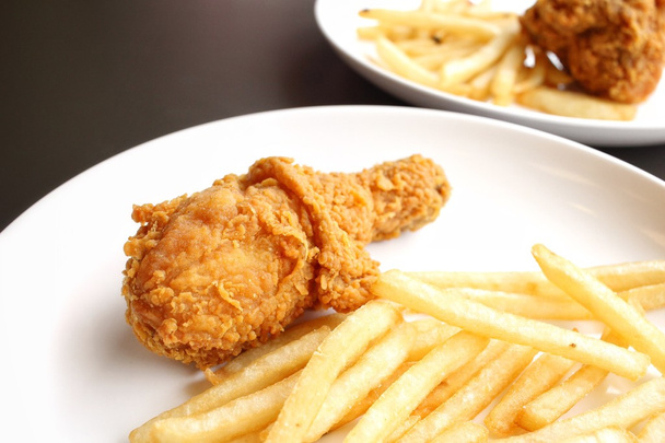Fried chicken leg with french fries - Photo, Image