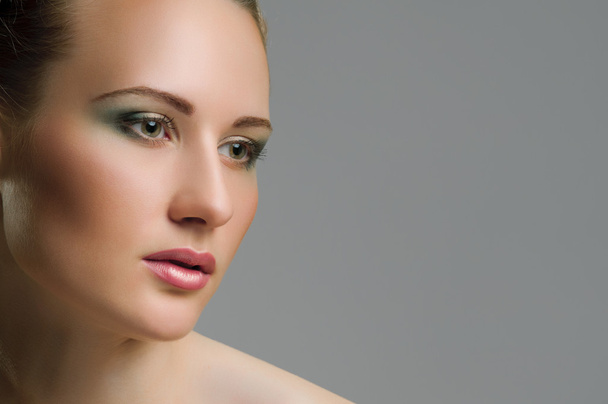 Make-up. Beautiful model with green make up - Valokuva, kuva