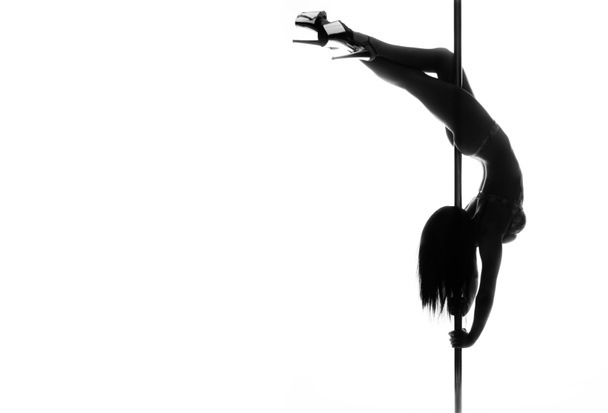 pole dance woman silhouette - Foto, imagen