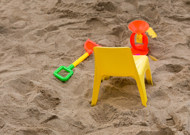játék, gyerek játék homok élvezze a játszótéren - Fotó, kép