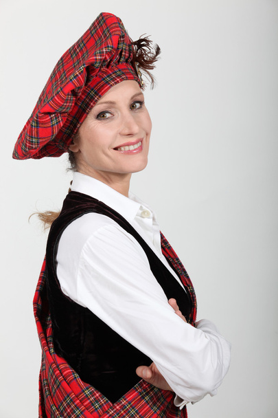 Woman wearing traditional scottish outfit - Foto, immagini