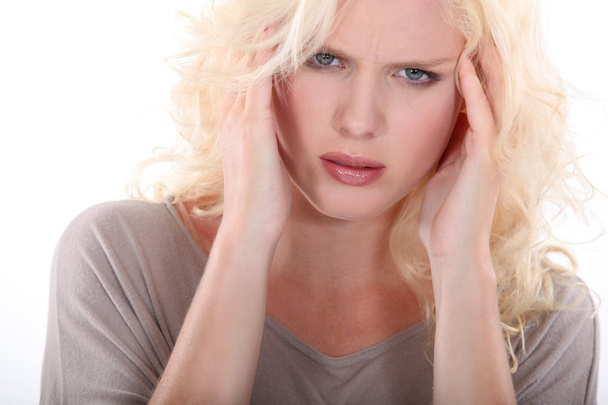 Young blonde woman with a headache - Zdjęcie, obraz