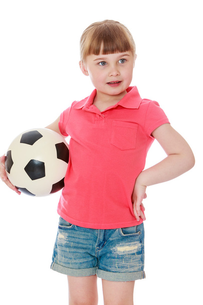 Girl holding soccer ball - Foto, afbeelding