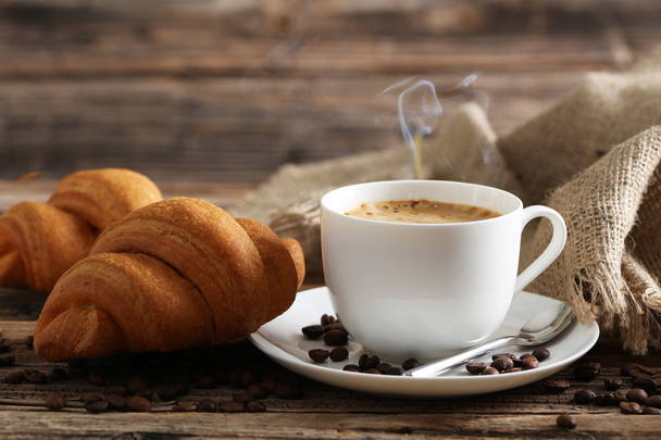 Delicious croissants with cup of coffee - Photo, Image