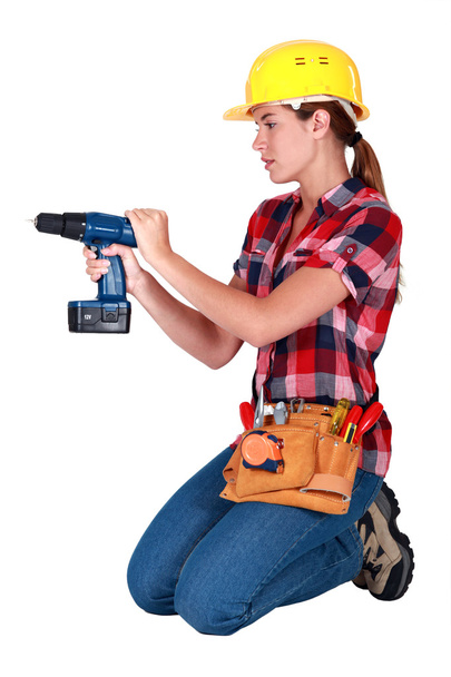 Woman with a cordless drill - Fotó, kép
