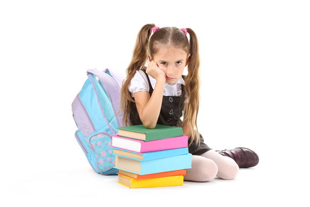 piękne dziewczynki, książki i plecak na białym tle - Zdjęcie, obraz