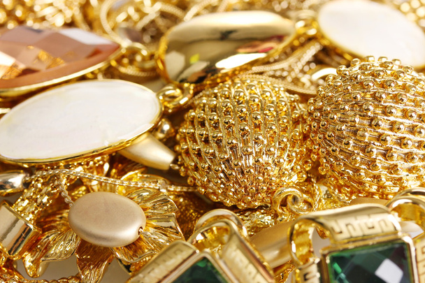 Various gold jewellery closeup - Photo, image