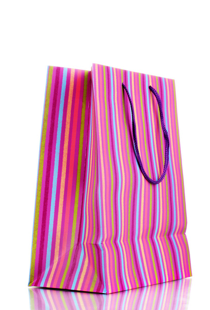 Striped gift bag isolated on white - Photo, Image