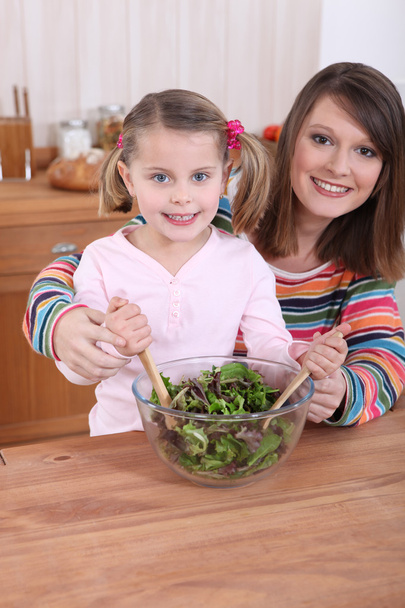 Mom and daughter cooking - Photo, Image