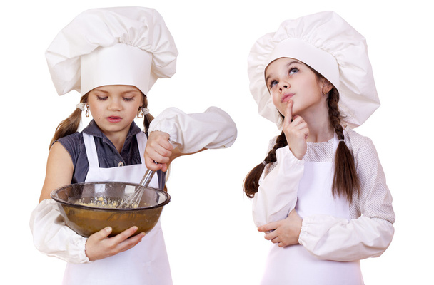 Cooking and people concept - Two Little girls in a white apron  - Foto, imagen