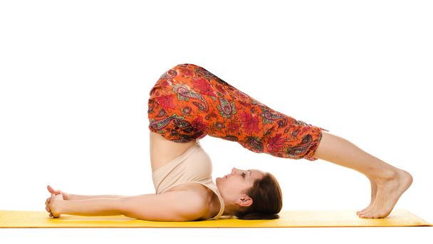 yogi féminin pratiquant des exercices de yoga
 - Photo, image