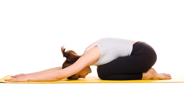 mujer joven practicando ejercicios de yoga
 - Foto, Imagen
