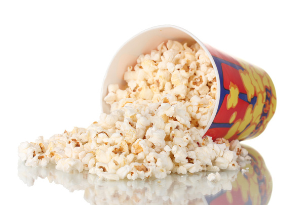 Full bucket of popcorn dropped isolated on white - Фото, зображення