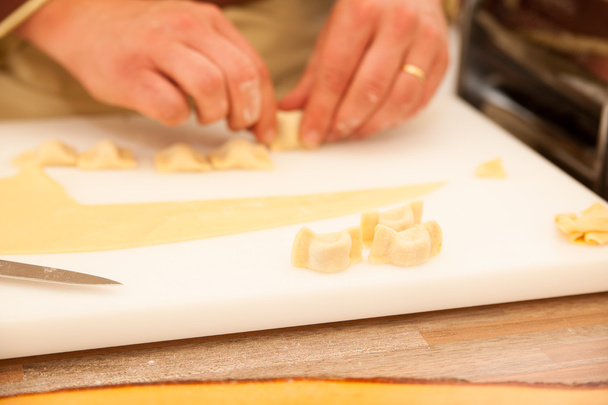 Cheef making zlikrofi pasta lokal speciality in Idrija Slovenia - Photo, Image
