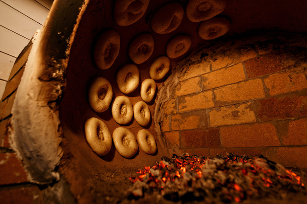 process of cooking tandoor bread in national tandoor owen - Photo, image