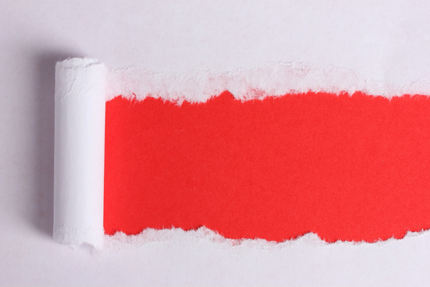 Torn paper with red background - Valokuva, kuva
