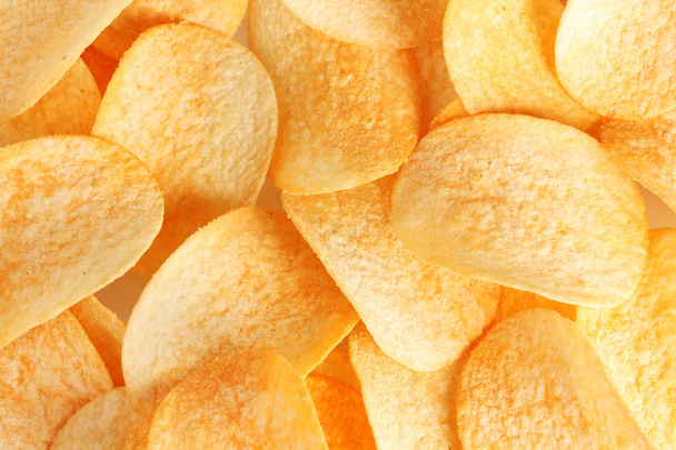 Delicious potato chips closeup - Fotografie, Obrázek