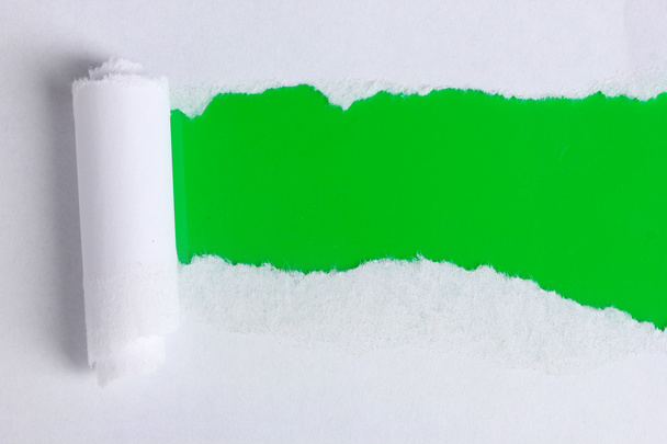 Torn paper with green background - Фото, зображення